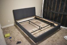 the bed frame is made up and ready for us to use it as a headboard