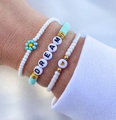 Heishi Bracelets Kids Heishi Bracelet Clay Beads Bracelet Summer Bracelets Gold Bracelets Bracelet Stack Flower Bracelet Peace Sign Girls - Etsy White Bohemian Stretch Bracelet For Friendship, Personalized White Bohemian Beaded Bracelets, Personalized White Bohemian Stretch Bracelet, Bohemian Personalized White Stretch Bracelet, White Bohemian Personalized Friendship Bracelets, Bohemian White Personalized Friendship Bracelets, Personalized White Bohemian Friendship Bracelets, White Bangle Friendship Bracelets With Letter Beads, Bohemian White Beaded Bracelets With Letter Beads