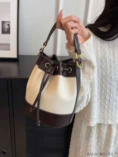 BagForLove - Effortlessly Chic Drawstring Tote Bag Product Description Color Beige Type Bucket Bag Bag Size Mini Pattern Type Colorblock Material PU Leather Size Chart INCH CM Bag Length Bag Width Bag Height Handle Height 7.9 inch 5.1 inch 7.1 inch 4.7 inch Bag Length Bag Width Bag Height Handle Height 20 cm 13 cm 18 cm 12 cm Details Pictures Similar Products h2 { text-align: center; } /* æ¢è¡ */ li{ white-space: normal; word-break: break-all; word-wrap: break-word; } .red-box { width: 100%; display: flex; flex-direction: row; flex-wrap: wrap; justify-content: center; } .red-box > div { width: 190px; height: 250px; margin: 10px; } .red-box > div > a > img { width: 190px; height: 250px; } .size-box { width: 100%; margin: auto; white-space: nowrap; } .table { border-collapse: collapse; bor White Hobo Bag For Travel, White Hobo Bag With Mobile Phone Bag For Travel, White Hobo Bag With Mobile Phone Pocket For Travel, Cream Bucket Shoulder Bag With Adjustable Strap, White Bucket Shoulder Bag With Adjustable Strap, Cream Shoulder Bucket Bag With Adjustable Strap, White Bucket Bag With Mobile Phone Holder, Large Capacity Cream Bucket Bag, Daily Use Crossbody Drawstring Bag With Adjustable Strap