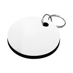 a white and black round keychain with two rings on the end of it