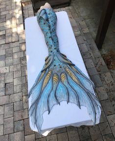 a drawing of a mermaid tail on a mattress