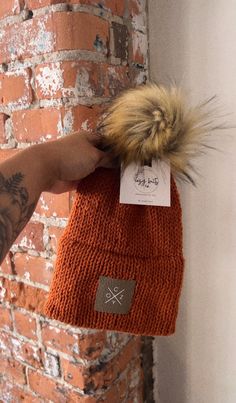 Cozy Collection Stay warm in this soft hat this winter. Knit hat with faux fur pom  C o z y logo 🤍 Color: Pumpkin Spice Warm Bonnet For Fall, Cozy One Size Bonnet For Fall, Cozy One-size Bonnet For Fall, Warm Hats For Cold Weather In Fall, Cold Weather Fall Hats For Winter Wear, Soft Knit Winter Hats For Fall, Soft Knit Hat For Fall And Winter, Warm Fall Hats For Cold Weather, Trendy Winter Hats With Faux Fur Lining