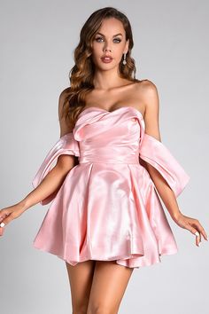 Celebrate in style with the Evelyn Pink Satin Puff Birthday Mini Dress. This playful mini dress features luxurious satin fabric and voluminous puff sleeves, creating a fun and feminine look perfect for birthdays and special occasions. The vibrant pink hue adds a touch of excitement, while the fitted bodice and flared skirt ensure a flattering silhouette. Shine and dazzle as you make unforgettable memories in this eye-catching and chic dress. Handmade customization Fabric composition: 90% polyest Chic Party Dress With Balloon Sleeves, Evening Puff Sleeve Satin Dress With Ruffles, Chic Puff Sleeve Bubble Dress For Party, Spring Satin Mini Dress With Puff Sleeves, Feminine Puff Sleeve Mini Dress For Party, Spring Evening Satin Puff Sleeve Dress, Pink Bubble Dress For Spring Party, Elegant Pink Bubble Dress For Spring, Elegant Pink Puff Sleeve Mini Dress