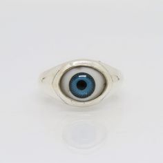 Sterling Silver Evil Eye Blue Dome Ring ...Marked 925...Total of weights 3.9grams...Size 6...Measure of Face 11.3MM...It's in very good condition. Blue Sterling Silver Rings With Polished Finish, Blue Sterling Silver Ring With Polished Finish, Blue Classic Sterling Silver Signet Ring, Classic Blue Sterling Silver Signet Ring, Blue Sterling Silver Open Ring, Blue Open Ring With Polished Finish, Handmade Blue Sterling Silver Signet Ring, Blue Sterling Silver Hallmarked Signet Ring, Blue Hallmarked Sterling Silver Signet Ring