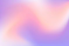 a blurry background with pink and blue colors