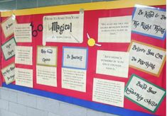 a bulletin board with several different types of writing on it and some paper pinned to the wall