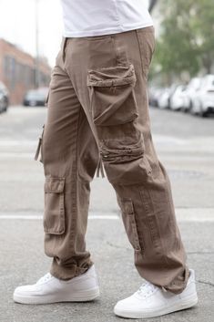 Elevate your casual wardrobe with our Baggy Fit Cargo Pants, designed to combine style, comfort, and functionality. Crafted with precision, these pants offer a relaxed fit and practical features for everyday wear.Key Features:Fabric: Made from 100% cotton, featuring a garment-washed finish for added softness and durability.Fit: Baggy fit for a relaxed and contemporary silhouette.Color Options: Available in taupe.Sizes: Offered in a range of waist and inseam sizes, including 30/30, 32/30, 34/30, Plus Size Mens Clothing, Cargo Pants Baggy, Fit Cargo Pants, Cart Ideas, Activewear Sets, Simple Tshirt, Fleece Joggers, Cargo Pants Men, Skirt Leggings