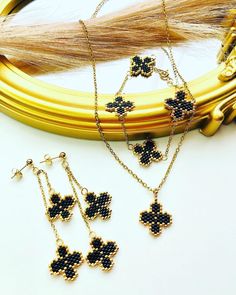 four - leaf clover necklace and earring set in gold, black or white seed beads