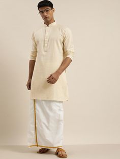 VASTRAMAY Men Cream Pure Cotton Kurta with Mundu Upgrade your ethnic wardrobe with this cream-colored pure cotton kurta paired with a traditional mundu. Made with high-quality fabric, this ensemble combines comfort and style seamlessly. Key Features: Material: Pure Cotton Color: Cream Includes: Kurta and Mundu Size Options: Available in various sizes Specifications: Brand: VASTRAMAY Style: Traditional Kurta with Mundu Fit: Regular Occasion: Ethnic Wear Material & Care: Solid Mundu Slip-on closur Cream Cotton Silk Kurta With Traditional Drape, Off White Straight Kurta For Transitional Season, Cream Cotton Silk Kurta For Eid, Beige Straight Kurta For Transitional Season, Transitional Off-white Cotton Set, Cream Straight Kurta For Navratri, Cream Long Sleeve Cotton Silk Kurta, White Handloom Kurta For Eid, Off White Straight Kurta For Diwali