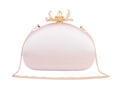 Embrace the epitome of elegance with our Silk Round Clutch, adorned with intricate flower hardware and a chic chain crossbody strap. This sophisticated accessory captures the essence of refined femininity, as the smooth silk exudes luxury and the detailed floral hardware adds a touch of romance. The versatile chain strap ensures effortless carrying, making it an ideal companion for any occasion. Elevate your style and make a statement with this beautifully crafted clutch, where the delicate allure of silk meets the timeless charm of floral design. Chic Rose Gold Evening Bag, Chic Rose Gold Formal Bag, Chic Rose Gold Evening Bag For Events, Chic Rose Gold Evening Bag For Event, Feminine Clutch Evening Bag, Chic Rose Gold Bag For Events, Feminine Gold Evening Clutch, Feminine Gold Evening Bag For Wedding, Chic Rose Gold Event Bag