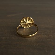 Mimi Favre Small Gold Lotus Ring – Meeka Fine Jewelry 14k Gold Flower Ring With Birth Flower, Delicate Gold Flower Ring With Rose Cut Diamonds, Dainty Gold Flower Ring Stamped 14k, Formal Gold Flower Ring Stamped 14k, Gold Round Flower Ring Fine Jewelry, Gold Flower Ring Fine Jewelry, Delicate Gold Flower Ring For Formal Occasions, 14k Yellow Gold Rings With Birth Flower Detail, Delicate Yellow Gold Birth Flower Rings