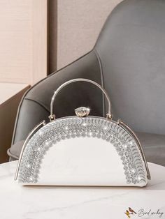 BirdinBag - Elegant Rhinestone-Embellished Ladies Evening Bag, Perfect for Parties Elegant Crystal Bags With Rhinestones, Crystal Clutch Bag With Rhinestones, Silver Bags With Detachable Handle For Events, Silver Event Bag With Detachable Handle, Silver Crystal Clutch Bag, Silver Handheld Bag With Bling, Silver Embellished Top Handle Evening Bag, Silver Bling Handheld Bag, Silver Event Bags With Detachable Handle