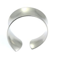 Tapered Brushed Anticlastic Aluminum Bangle Bracelet - johnsbrana - 4 Modern Metal Bangle With Polished Finish, Classic Metal Cuff Bracelets, Classic Metal Cuff Bracelet, Formal Stainless Steel Cuff Bracelet With Polished Finish, Modern Silver Bracelet With Shiny Finish, Formal Stainless Steel Bangle With Polished Finish, Adjustable Metal Cuff Bracelet With Polished Finish, Modern Silver Cuff Bracelet With Shiny Finish, Modern Silver Bracelets With Polished Finish