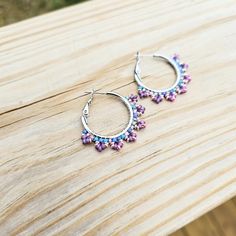 Add a splash of beachy colors to your summer!  Handmade hoop earrings created with fine glass seed beads in shades of Plum, Blush and Pink Lilac delicately woven onto Stainless Steel hoops.   💜 Everything at CyntheCreations is handmade with love - because you deserve to feel extraordinary! 💜  👉  Arrives in a gift box with bow, ready for giving. 🎁 👉  Measurements:  1 3/8 inches around. 👉  Lightweight and easy to wear 👉  304 Stainless Steel hoops 👉  Miyuki and Toho glass seed beads 👉  Thermally-fused extra strong thread For different colorways and styles, visit my shop:  https://www.etsy.com/shop/CyntheCreations ⭐  THINGS TO KNOW ABOUT BEADED JEWELRY:  While sealed for normal wear, glass beads are NOT WATERPROOF and should not be worn when swimming or bathing.     💜𝑫𝒆𝒔𝒊𝒈𝒏𝒆𝒅 Beaded Bohemian Hoop Earrings For Summer, Summer Beaded Earrings With Tiny Beads, Bohemian Hoop Earrings With Dangling Beads For Summer, Bohemian Hoop Earrings With Ear Wire For Summer, Bohemian Hoop Earrings For Summer, Bohemian Small Hoop Earrings For Summer, Summer Festival Hoop Earrings With Dangling Beads, Bohemian Beaded Hoop Earrings For Summer, Bohemian Hypoallergenic Hoop Earrings For Festivals