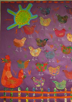 an art project with birds painted on purple paper and orange ribbon around the edges, in front of a fence