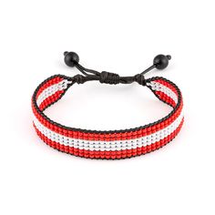 This adjustable handmade bracelet celebrates Austria heritage. Crafted from colorful beads in the iconic pattern of the Austria flag, this bracelet makes a bold yet understated style statement. An adjustable cord allows it to fit wrists of different sizes so it can be shared or worn year-round. Lightweight and versatile, it pairs well with casual or dressy outfits for a pop of color. Wear it to show your Austrian pride or as a conversation starter to share your cultural background. The intricate beading is done by hand, so each piece has its own unique texture and charm.    Exported By ExportYourStore :) Adjustable Jubilee Beaded Bracelets For Friendship, Casual Adjustable Friendship Bracelets With Colorful Beads, Casual Beaded Bracelets With Adjustable Band As Gift, Adjustable Red Friendship Bracelets With Colorful Beads, Red Beaded Bracelets With Adjustable Length, Casual Beaded Adjustable Friendship Bracelets, Red Beaded Bracelet With Adjustable Length, Adjustable Wristband With Round Beads For Festivals, Adjustable Round Beads Wristband For Festivals