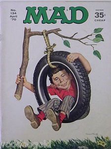 the cover of mad magazine featuring a boy hanging on a tire and holding a branch