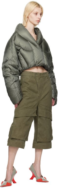 Down-filled quilted nylon taffeta jacket. · Shawl collar · Zip closure with velcro placket · Welt pockets · Concealed bungee-style drawstring at hem · Raglan sleeves · Zip pocket at interior · Fully lined Wholesale exclusivity at SSENSE. Supplier color: Moss Fill: 90% duck down, 10% duck feather. Utility Nylon Outerwear With Padded Collar, Utility Outdoor Outerwear With Zip Cuffs, Fall Nylon Outerwear With Cargo Pockets, Nylon Utility Parka With Cargo Pockets, Utility Nylon Parka With Cargo Pockets, Winter Nylon Parka With Cargo Pockets, Winter Nylon Outerwear With Cargo Pockets, Nylon Puffer Jacket With Zip Cuffs, Military Nylon Parka With Pockets