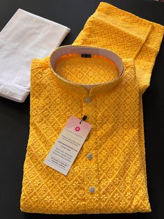 Mango Yellow Color Chikankari Work Men's Kurta Pajama Set with full Lucknowi embroidery work on the Kurta on the Front and back side of the Kurta. Kurta comes with a Soft Lining paired with white color cotton bottom/pajama. Kurta is Fully Lined. Very trendy and Classy Looking Mens Wear. Item : Men's Kurta PajamaReady to Wear : YesKurta Color : Mango Yellow Pajama Color : White Fabric : Georgette Pocket : YesWork : Chikankari Embroidery, Fancy ButtonsDisclaimer-For sizing please refer to the Size Mango Yellow Color, Lucknowi Embroidery, Yellow Pajamas, Chikankari Work, Mango Yellow, Chikankari Embroidery, Men's Kurta, Men Kurta, Kurta Pyjama