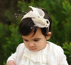 This is one of my favorite headpieces for girls or brides. The calla lilies are made of sinamay straw with some pearl beads in the center. It also can be great for upcoming holidays. It has a very elegant and classy look. This particular piece is on a headband, but it can also be made on the alligator pin instead. Please let me know about your preference. Ideal for any event, especially with the festive season coming up - perfect for those Christmas and New Years Eve Parties. PLEASE NOTE this pr Whimsical Adjustable Headband For Wedding, White Crown Headpieces As Gift, Whimsical Crown Headpiece For Wedding, Whimsical Wedding Crown Headpiece, Handmade Flower Headpiece For Wedding, Adjustable Hair Accessories With Matching Headband, Adjustable Satin Bow Hair Accessories For Wedding, Adjustable Wedding Hair Accessories With Satin Bow, White Headband Fascinator As Gift