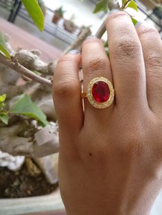 This ring is made with synthetic Ruby oval shape cut stone and AAA quality diamond cut round cubic zircon, beautifully hand made. Sizes: Ruby is 9 mm x 11 mm Zirconia rounds 1.50 mm Synthetic ruby cut is of rich red color which looks exactly like real ruby cut stone and zircon we used is of best quality and cutting which looks exactly like diamonds, they both compliments each other very well. Metal we used is guaranteed silver 925 which is real gold filled, Gold Filling is completely different f Antique Ruby Ring, Diamond Ring Silver, Ruby Diamond Ring, Rings Solitaire, Ruby Diamond Rings, Wedding Rings Solitaire, Mexican Jewelry, Gold Ring Designs, Victorian Rings