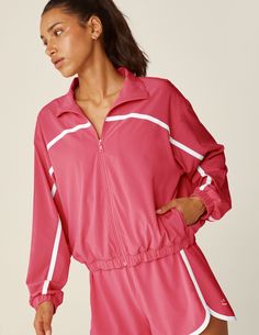 Sporty Moisture-wicking Track Jacket, Spring Sportswear Tracksuit For Running, Spring Sportswear Tracksuit, Spring Long Sleeve Track Jacket For Loungewear, Sporty Spring Tracksuit For The Gym, Spring Athleisure Tracksuit For Gym, Pink Athleisure Activewear For Leisure, Spring Long Sleeve Sports Tracksuit, Sporty Nylon Tracksuit For Sports