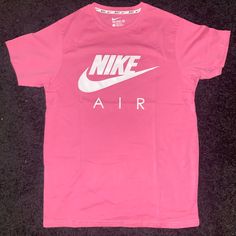 Brand New Without Tags. Never Worn Or Tried On. Great Work-Out Tee Or Just A Casual Tee. Pink In Color. Tagless. Authentic Nike Apparel Sporty Pink T-shirt With Logo Print, Trendy Pink Workout T-shirt, Sporty Summer Tops With Branding, Trendy Sports Tops With Logo Print, Nike T-shirt With Text Print For Sports, Pink Sportswear T-shirt For Workout, Nike Summer Workout T-shirt, Pink Short Sleeve Sportswear T-shirt, Athleisure Crew Neck Tops With Branding