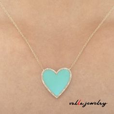 This Turquoise Heart Pendant features 2.72Gr with Turquoise and Round Diamonds sets in 14K Yellow Gold Elegant Turquoise Heart-shaped Jewelry, Elegant Turquoise Heart Cut Jewelry, Turquoise Jewelry With Heart Charm, Turquoise Heart-cut Jewelry With Heart Charm, Turquoise Heart Cut Jewelry With Heart Charm, Heart-shaped Turquoise Gemstone Jewelry, Elegant Heart-shaped Turquoise Necklace, Round Diamond Setting, Turquoise Heart