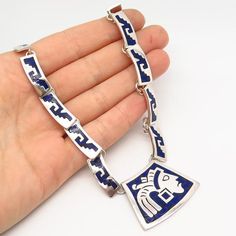 925 Sterling Vintage Mexico Lapis Lazuli Gem Inlay Tribal God Chain Necklace 16"Weight: 68.7gWELCOME TO PAWN SHOPWe are an actual pawn shop and have been in business for over 25 years.Since 1990, our establishment has been serving a variety of clients by providing them with short term cash solutions and options of liquidity regarding their treasured heirlooms.Acknowledging that today′s customers are very sophisticated and are looking for a variety of investments, our acquisitions are hand-picked Symbolic Blue Engraved Necklaces, Blue Sterling Silver Necklace With Inlay, Collectible Blue Inlay Necklace, Silver Sterling Silver Necklace With Inlay, Blue Engraved Necklace Collectible, Collectible Blue Engraved Necklace, Vintage Mexico, Garnet Gem, Real Turquoise