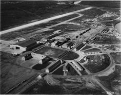 an aerial view of a large industrial area with many buildings and roads in the foreground