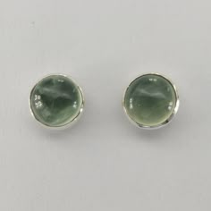 Lovely Prehnite Earrings  -  dainty Stud Earrings are the perfect gift for her.  Our Round Stud Earrings are crafted from genuine 925 Sterling Silver, they offer a hypoallergenic, nickel-free experience. Perfect for sensitive skin, these unique earrings are a blend of elegance and artisanal quality Size of one Earring in total we offer 6mm / 0.24 inch and 8mm / 0.31 inch 10mm / 0.39 inch GIFT-READY PACKAGING: Each unique jewelry is elegantly packaged in a nice gift box, making it an ideal presen Silver Stud Earring, Minimalist Silver Earrings For May Birthstone, Sterling Silver Round Cut Earrings For May Birthstone, Green Cabochon Round Earrings, Green Round Cabochon Earrings, Silver Gemstones With Matching Earrings For Gift, Silver Gemstones With Matching Earrings As A Gift, Hypoallergenic Round Earrings For May Birthstone, Silver Gemstone Round Stone Earrings