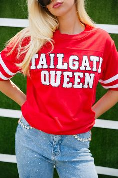 TAILGATE QUEEN RED VARSITY TEE TEE Judith March Sporty Letter Print Tops For Tailgating, University Red Varsity Tops With Letter Print, Red Varsity Tops For Fan Gear, Varsity Fan Gear T-shirt With Lettering, Varsity Style Fan Gear T-shirt With Lettering, Varsity Lettering T-shirt For Fan Gear, Red Varsity T-shirt With Team Name, Red College T-shirt For Football Season, Red T-shirt For College Football Season