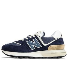 The New Balance 574 Legacy 'Navy Angora' is a stylish sneaker that is perfect for everyday wear. It features a blue upper crafted from premium suede, durable plastic and textile materials. The midsole is equipped with ENCAP technology, a combination of durable and stable polyurethane edges and soft, shock-absorbing EVA foam. The rubber sole provides excellent traction and durability, making it suitable for a variety of activities. The Navy Angora colorway is inspired by the classic 574 series, giving it a timeless look. (SNKR/Unisex/Low Top) New Balance 574 Navy, New Balance 574 Legacy, New Balance 574, Eva Foam, Stylish Sneakers, The Navy, Low Top, New Balance, Rubber Sole