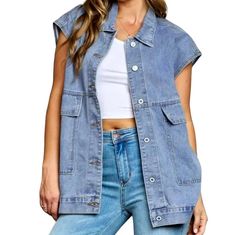 Elevate your fashion game with our 2024 Spring Collection denim vest, a perfect blend of vintage and contemporary trend. This couture-forward piece is sure to make a statement with its oversized silhouette, stonewashed finish, and buttoned closure.Distinctive Features: Fashionable and Chic: This denim vest is patterned to elevate your mode and add a touch of sophistication to any outfit. Oversized Silhouette: The oversized fit of this vest is not only on-trend, but also provides a non-formal and effortless look. Vintage Vibes: Crafted with a vintage-inspired design, this vest adds a touch of nostalgia to your wardrobe. Stonewashed Finish: The stonewashed finish of this vest adds a unique and urban touch, making it stand out from the crowd. Buttoned Closure: The buttoned closure adds a conv Womens Denim Vest, Vest For Women, Effortless Look, Oversized Silhouette, Vintage Inspired Design, Look Vintage, Fashion Vintage, Vintage Vibes, Upgrade Your Style