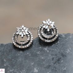 Sterling Silver Jewelry, Genuine Pave Diamond Earrings, Size 14X12 mm Baguette Diamond Earrings, Pave Diamond Jewelry, Stud Earrings, Gifts Earring Details: Item Code: GJ-ER0072 Diamond Weight :0.72 Cts Baguette Diamond Weight: 0.30 cts Gross Weight: 3.74Grams Earring Size: 14X12 MM NOTE:- All The Products Are Designed And Manufactured In My Workshop By Me & My Team. Shown Products Are Purely Handmade. Custom Orders Are Open Handly Accepted. We Are Perfect Choice For Any Custom Jewelry Manuf Silver Sterling Silver Diamond Earrings With Halo Design, Silver Dazzling Diamond Earrings With Elegant Design, Dazzling Silver Hand Set Diamond Earrings, Silver American Diamond Earrings As Gift, Silver American Diamond Earrings For Gift, Silver Bridal Earrings With Halo Design For Party, Dazzling Silver Earrings With Elegant Design, Silver Cubic Zirconia Hand Set Cluster Earrings, Hand Set Silver American Diamond Earrings