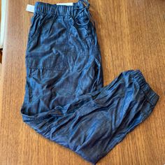 Gap Joggers Nwt Size M. 100% Lyocell. Dark Indigo. Comfy For Travel Or Around Town. Casual Denim Blue Tencel Jeans, Gap Denim Blue Summer Bottoms, Summer Gap Denim Blue Bottoms, Summer Denim Blue Gap Bottoms, Casual Mid-rise Tencel Jeans, Casual Indigo Tapered Leg Pants, Casual Dark Wash Tencel Jeans, Spring Utility Jeans With Elastic Waistband, Gap Dark Wash Cotton Bottoms