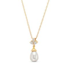 Timeless and elegant, this Three Stone Pearl Pendant Necklace features a pearl beneath three pear cut diamonds totaling 0.15 carats. Pear-shaped Diamond Necklace With Pearl Drop, Elegant Pear-shaped Drop Necklace For Formal Occasions, Formal Akoya Pearl Necklace With Pear Shape, Formal Akoya Pearl Pear-shaped Necklace, Formal Akoya Pearl Pear Shaped Necklace, Formal Pear-shaped Akoya Pearl Necklace, Formal Yellow Gold Drop Necklace With Pearl Pendant, Elegant Pear-shaped Pearl Drop Necklace, Classic Pear-shaped Diamond Drop Necklace