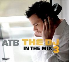 a man talking on a cell phone while sitting in front of a window with the words atb the dub3 in the mix