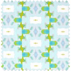 a blue and green pattern on fabric