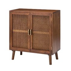 a wooden cabinet with wicker doors and legs