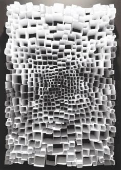 an abstract sculpture made out of white plastic tubes