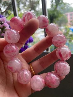 Material:pink rhodonite beads  size :Approx 17mm Top beads 19mm   quantity: one strand  6mm approx 29 pcs one strands 7mm approx25 pcs one strands 8mm approx 22 pcs one strands 9mm approx 21pcs one strands 10mm approx 19 pcs one strands 11mm approx 18pcs one strands 12mm approx 16 pcs one strands 13mm approx 16 pcs one strands 14mm approx 15 pcs one strands 15mm approx 14pcs one strands 16mm approx 14 pcs one strands 17mm approx 13pcs one strands 18mm approx 13pcs one strands 19mm approx 12pcs o Pink Beaded Jewelry With 8mm Round Beads, Pink Round Spiritual Beaded Bracelets, Pink Round Beaded Jewelry 8mm, Pink Round 8mm Bead Jewelry, Pink Bracelets With 8mm Round Beads, Pink Natural Stones Crystal Bracelet, Pink Rose Quartz Round Beaded Bracelets, Pink Crystal Gemstone Bracelet, Pink Gemstone Crystal Bracelet