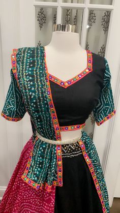 Bandhini Designer big flair 8mts Chaniya Choli for Navratri Season in elegant Black , green and rani pink combo size 38 plus margin. Beautiful Chaniya choli with 8 meter flair. Fits size 38 plus margin Green Lehenga With Unstitched Blouse In Chinon, Multicolor Sharara For Party During Navratri, Semi-stitched Green Choli For Navratri, Anarkali Green Choli For Navratri, Multicolor Choli With Pallu For Party, Green Unstitched Blouse Choli For Festivals, Green Blouse Piece With Gota Work For Festivals, Fitted Multicolor Saree In Chinon Fabric, Green Bollywood Choli In Chinon