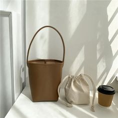 Length :16cm width :11cm height :21.5cm Beige Rectangular Bucket Bag With Large Capacity, Trendy Beige Handheld Bucket Bag, Rectangular Beige Bucket Bag With Mobile Phone Bag, Trendy Handheld Beige Bucket Bag, Khaki Rectangular Bucket Bag, Rectangular Khaki Bucket Bag For Shopping, Beige Handheld Bucket Bag, Khaki Bucket Bag For Daily Use, Beige Bucket Bag For Everyday Use