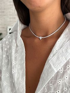 Handmade sterling silver tennis choker necklace set with teardrop cubic zirconia stone, making a simple but elegant statement.  The perfect layering piece or minimalist necklace. This necklace is perfect to wear as everyday jewelry and combined layered with other necklaces. Hypoallergenic, lightweight and minimalist. ► FEATURES: * Made of sterling silver 925 * Gold and rose gold are plating over a silver 925 ► MEASUREMENT : Chain length: 11.8" / 30 cm Stones size: 2.5 mm In addition you will rec Silver Cubic Zirconia Tennis Choker Necklace, White Rhinestone Tennis Necklace, Cubic Zirconia Tennis Choker Necklace Gift, Cubic Zirconia Tennis Choker Necklace, Gift Cubic Zirconia Tennis Choker Necklace, Tennis Choker Necklace, Unique Choker Necklaces, Rose Gold Choker, Choker Necklace Online