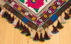 "almost width = 74.00 cm = 29.13\" length = 54.00 cm = 21.26\" the second photo from last is to show how the dimensions given in the description work. red white yellow brown pink green beige blue 2000s from Uzbekistan handmade tassel - segusha dry clean only VINTAGE UZBEK TASSELS : \" Segusha \" ( Triangle ) is a decorative embellishments, whose function, was to decorate the beddings tucked away folded against the walls of a yurt or tent. These objects made with great care were attached on the c Bohemian Dupatta With Woven Motifs For Ceremonial Use, Bohemian Festive Dupatta With Tassels, Traditional Dupatta With Tassels For Festivals, Multicolor Dupatta With Latkans For Traditional Ceremonies, Bohemian Festival Dupatta With Traditional Patterns, Festive Bohemian Dupatta With Latkans, Traditional Tassel Dupatta For Festivals, Bohemian Dupatta With Tassels For Festivals, Bohemian Dupatta For Rituals