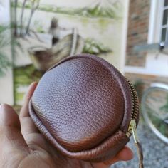 Ideal for quick trips or outdoor activity, our Zip Leather Coin Purse is for those who like to keep things simple and only need to carry the essentials. Handmade by leather artisans on Lake Atitlan, the zip coin purse is constructed with a golden YKK zipper attached with a hand-stitched leather puller to facilitate opening. The full-grain pebbled black leather develops a smooth, much-desired patina with use. Specs Length: 4.5´´ Height: 3.5´´ Depth: 1.0''Material: Full-grain bovine leather Brown Leather Coin Purse With Zipper Pocket, Leather Coin Purse With Zipper, Brown Leather Coin Purse With Zipper Closure, Versatile Leather Coin Purse With Zipper, Leather Coin Purse With Zipper For Everyday Use, Everyday Leather Coin Purse With Zipper, Leather Coin Purse With Zipper Closure For Everyday Use, Daily Use Leather Coin Purse With Zipper, Zipper Pouch Coin Purse For Everyday Use