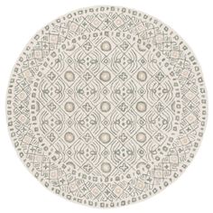 a round rug with an intricate design on the center and sides, in grey and white colors