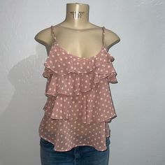 Pink Polka Dot Blouse With Ruffles Brand: Zinga Size Medium New With Tags 100% Polyester Summer Polka Dot Blouse With Ruffles, Summer Ruffled Polka Dot Blouse, Feminine Polka Dot Tops For Summer, Cute Polka Dot Sleeveless Top, Cute Polka Dot Top For Spring, Cute Spring Polka Dot Tops, Cute Sleeveless Blouse With Ruffles, Chic Polka Dot Swiss Dot Tops, Chic Swiss Dot Polka Dot Tops