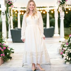 Elevate your fall wardrobe with our Women's Lace Long Sleeve V Neck Maxi Dress. Perfect for casual boho vibes or as a charming wedding guest outfit, this dress features delicate lace detailing and a flattering smocked waist. Lace Trim Maxi Dress For Fall, Maxi Dress With Lace Trim For Fall, Fall Maxi Dress With Lace Trim, Fall Garden Party Dress With Lace Trim, Spring Flowy Lace Patchwork Maxi Dress, Elegant Flowy Boho Dress For Fall, Spring Modest Dress With Lace Trim, Modest Spring Dresses With Lace Trim, Long Sleeve Maxi Dress With Lace Trim For Brunch